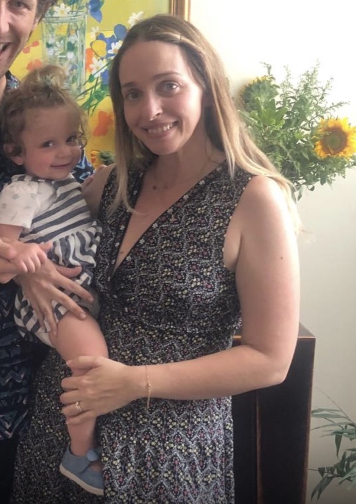 Sharee holding her daughter